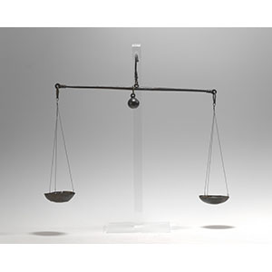 Scales with arms the same length and sliding weight