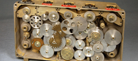 Geared plate for electromechanical calculator